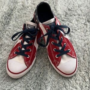 Red white and blue American flag Converse sneakers.